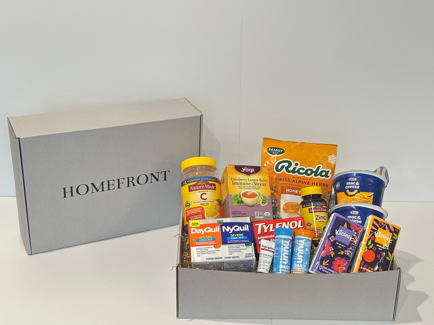 Care package for deployed service member with vitamins, medicine, and snacks
